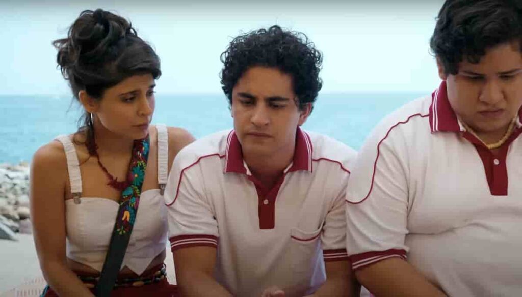 Acapulco cast AppleTV+ featuring Gabriela Milla, Enrique Arrizon, and Fernando Carsa sitting together