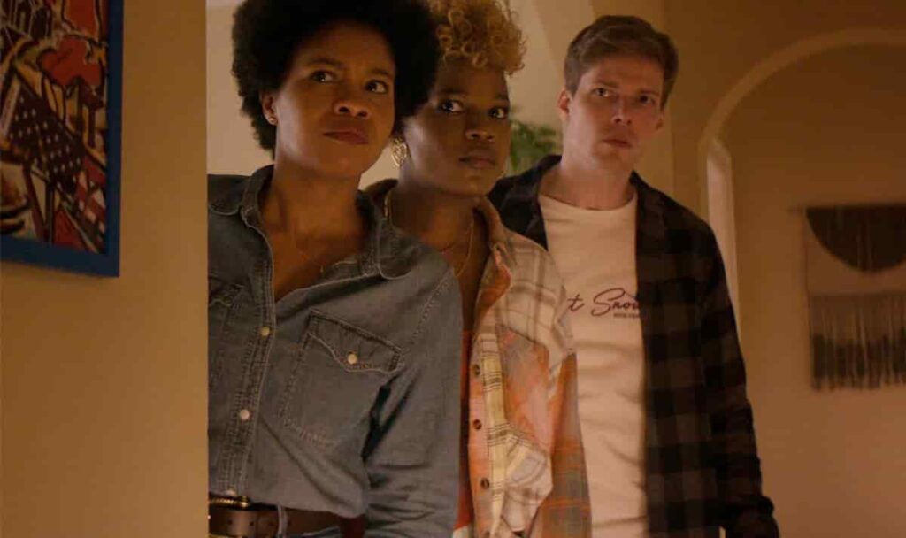 Ashleigh Murray as Hazel, Sinclair Daniel as Nella and Hunter Parrish as Owen standing together in The Other Black Girl series