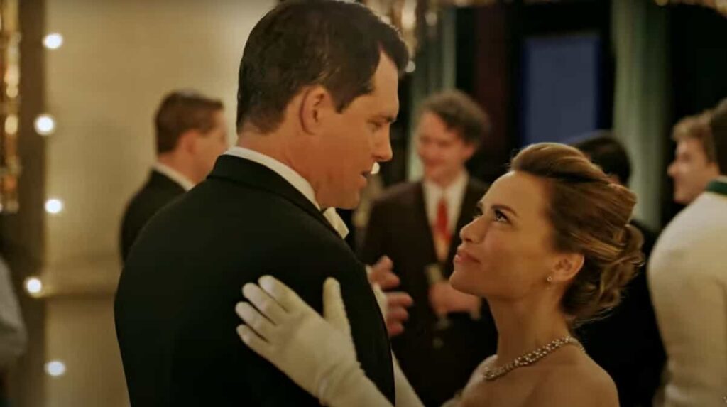 Kristoffer Polaha and Bethany Joy Lenz dancing together in A Biltmore Christmas hallmark movie