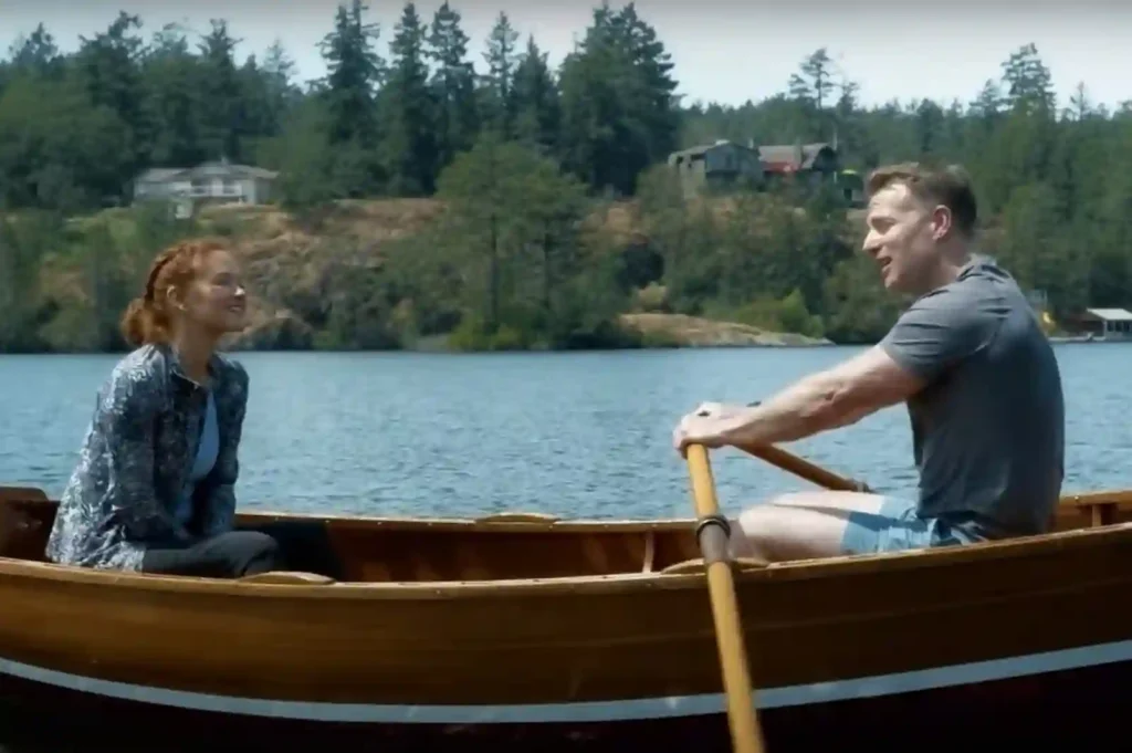 Emily and Matthew kayaking through Lake Morton in Guiding Emily movie