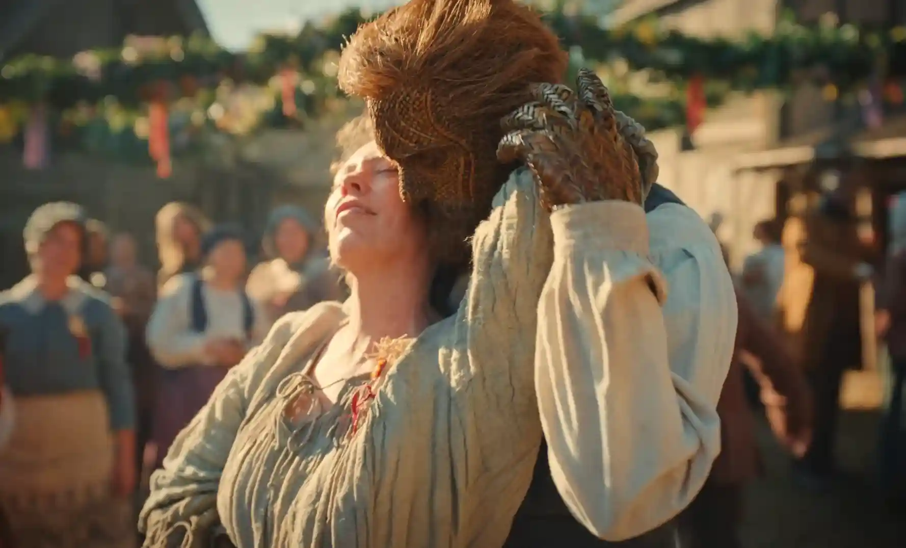 Wicker (2026): Where to Watch, Release Date & Streaming Info Olivia Colman in Wicker, sharing a romantic moment with a man made of woven wicker as she leans back in his embrace.