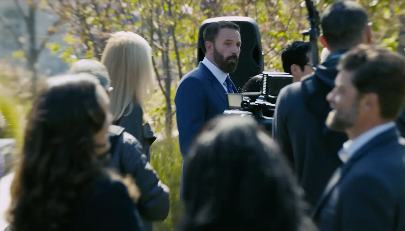 Where was Animals (2026) filmed? Real Locations Behind the Netflix Thriller Ben Affleck in a blue suit surrounded by a crowd during an outdoor campaign scene in Animals (2026)
