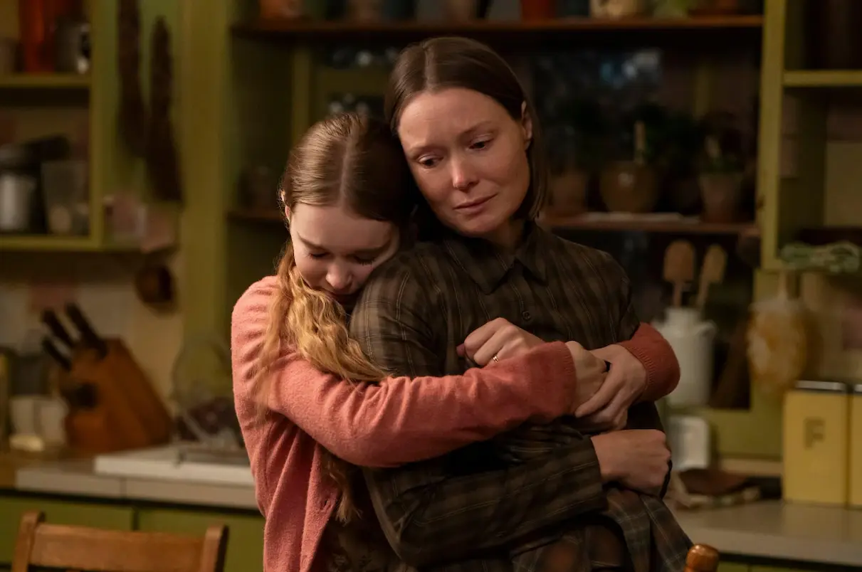 Where to watch Carrie TV Series (2026): Streaming Guide, Episodes and Everything You Need to Know Summer H. Howell as Carrie White hugs her mother, Margaret White, played by Samantha Sloyan, from behind in Carrie (2026)